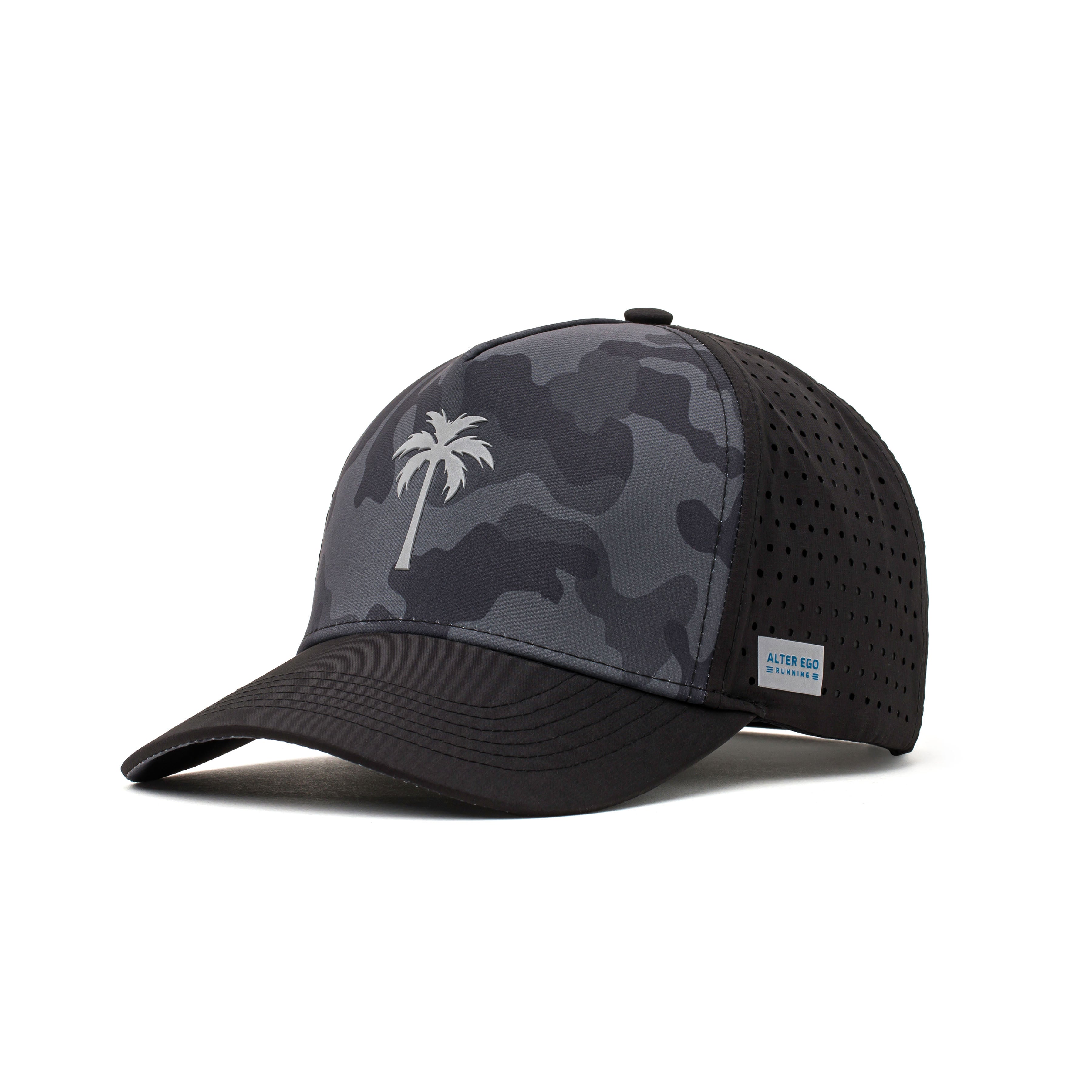 Angled view of a black and camo performance hat showcasing a white palm tree logo, curved brim, and sweat-wicking material for all-day comfort.