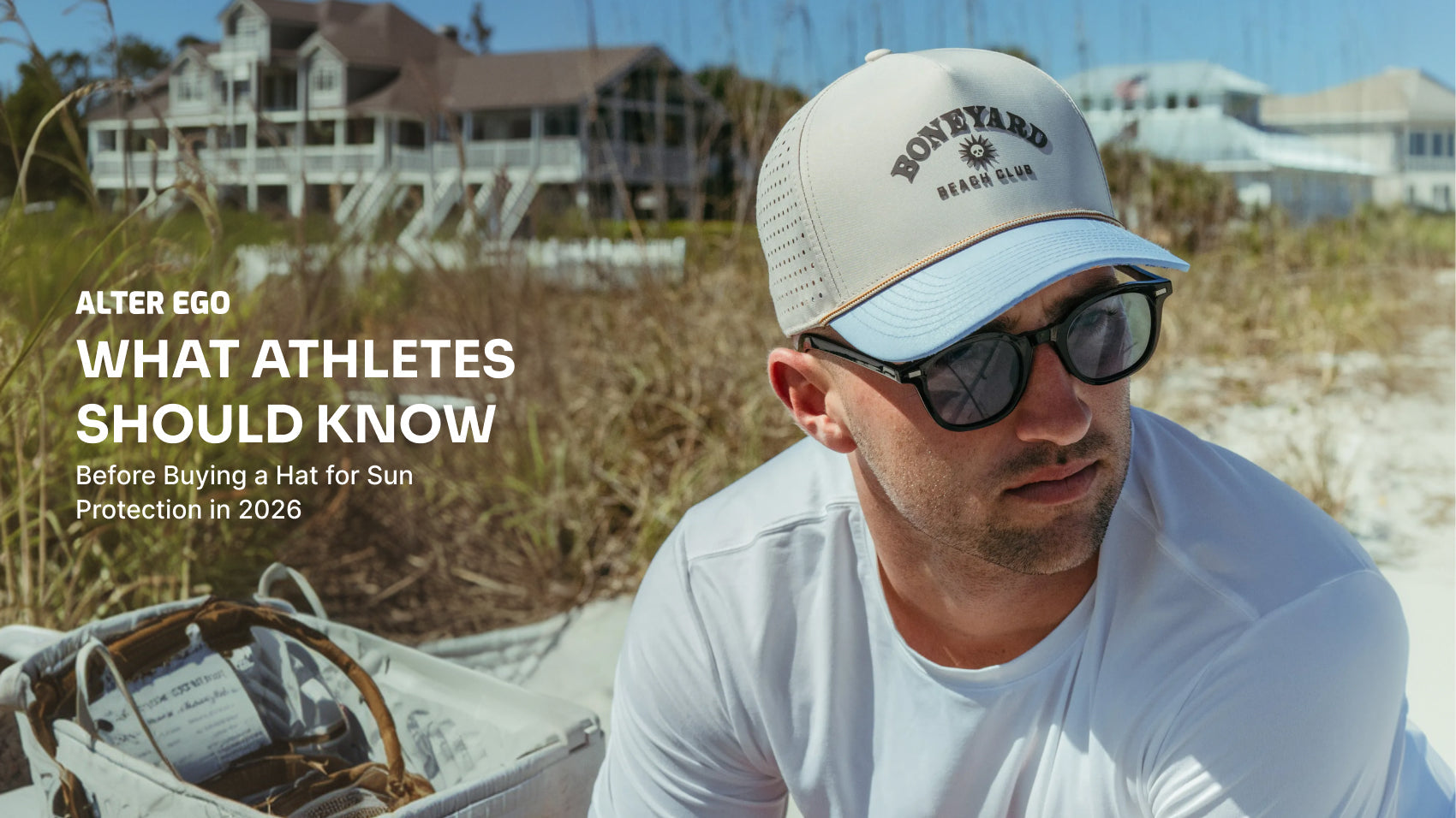 Alter Ego structured and unstructured performance hats displayed on a sandy beach