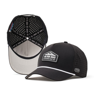 Black performance hat with a white mountain logo on the front and a breathable black mesh back, designed for outdoor activities and durability.