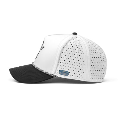 Side view of a white performance cap featuring a black skeleton logo, curved brim, and perforated panels for enhanced ventilation and style.