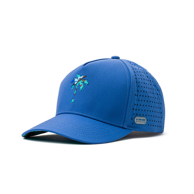 Angled view of a blue performance hat featuring a green palm tree design, lightweight fabric, and sweat-wicking technology for active wearers.