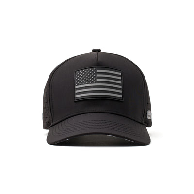 Front view of a black hat with a bold silver American flag emblem and structured design, perfect for sports and casual wear.