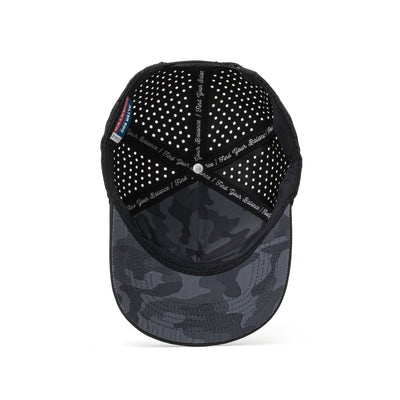 Interior and back view of a black hat with a dark camo mesh panel, adjustable strap, and perforated details for optimal airflow and comfort.