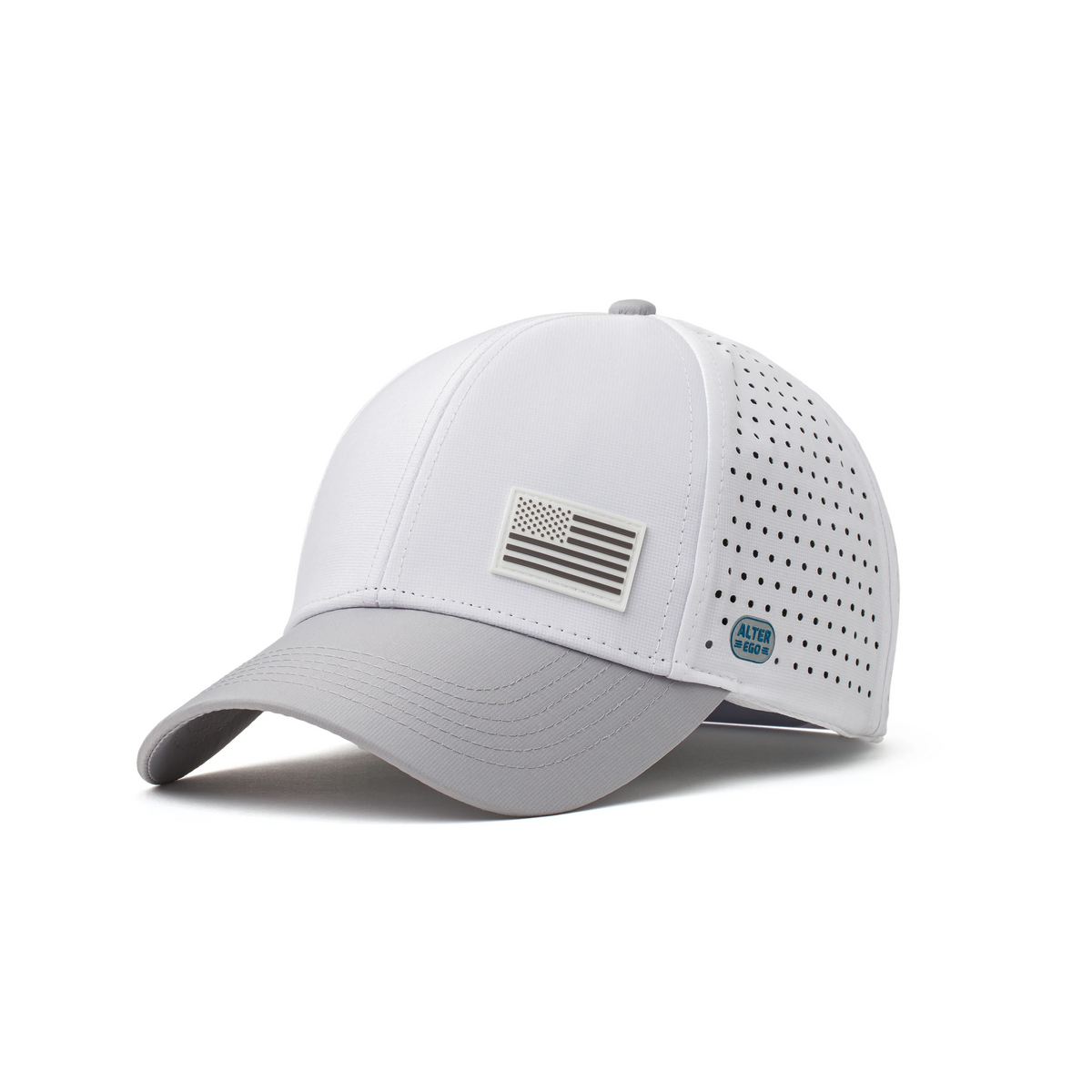 Three-quarter view of a white Alter Ego Running performance hat with tonal American flag patch, grey brim, and perforated side panels.