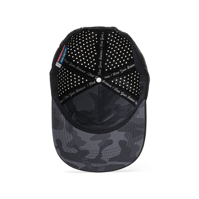 Interior and back view of a black hat featuring a dark camo-patterned mesh panel, adjustable strap, and perforated sides for optimal breathability.