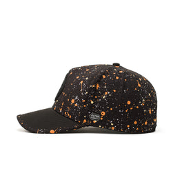 Alter Ego Coaster Splash Dark Splatter hat shown from the side, featuring a black base with orange and white splatter detailing, black brim, laser cut ventilation panels, and reflective Alter Ego logo patch.