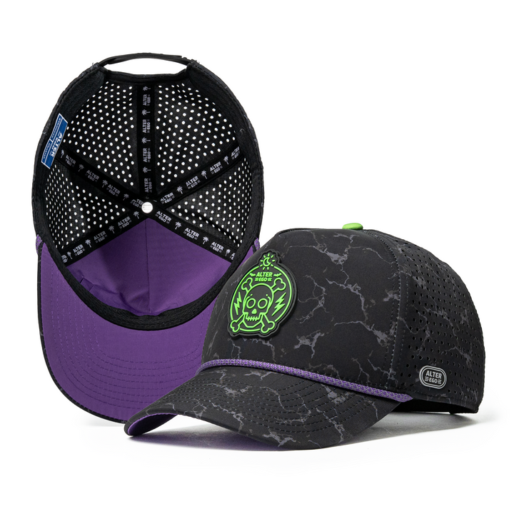Alter Ego Coaster Splash Toxic Storm Halloween hat featuring a black marble-inspired pattern, neon green skull logo, purple accent trim, breathable laser-cut panels, and a curved bill.