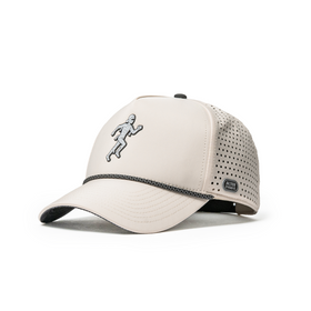 Alter Ego Coaster Splash Ivory Mummy hat in a three-quarter front view, featuring an ivory crown, embroidered running mummy graphic, curved bill with contrasting black trim, laser-cut ventilation, and a reflective Alter Ego side badge.