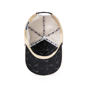 Alter Ego Coaster Splash Ivory Mummy hat featuring a black marble-inspired underbill, breathable laser-cut panels, and an adjustable snapback closure.