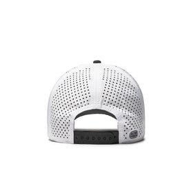 Alter Ego Coaster Splash Trick or Treat hat shown from the back, featuring a white crown with laser cut ventilation panels, black adjustable snapback closure, and reflective Alter Ego patch.