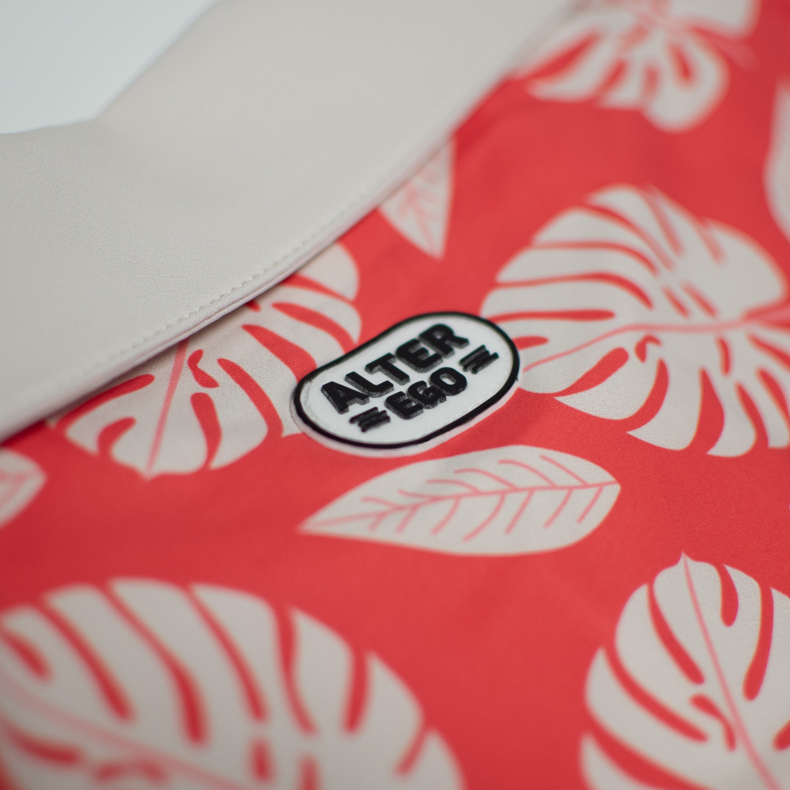 Performance Polo Palm Print Coral