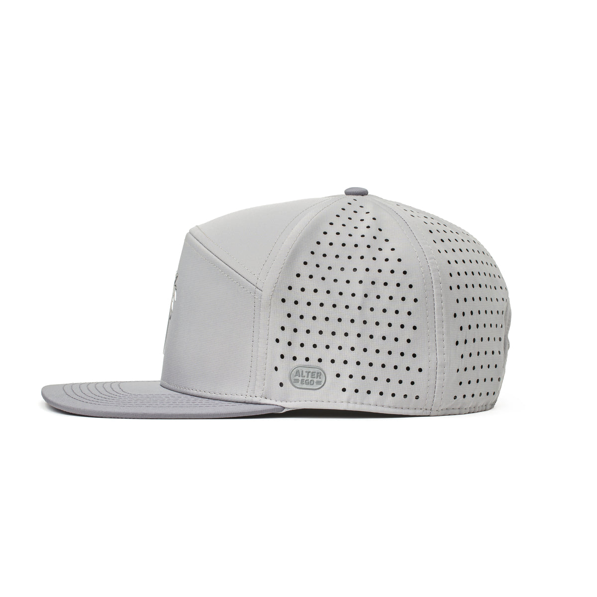 Alter Ego Drifter Splash Royal Chrome hat in a light chrome gray, shown from the side with a flat bill, laser-cut back panels, and a reflective Alter Ego side badge.