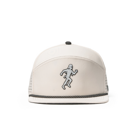 Front view of the Drifter Splash Ivory Mummy hat featuring a flat bill, ivory crown, black patterned rope detail, and embroidered mummy design.