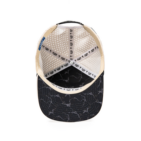 Inside view of the Drifter Splash Ivory Mummy hat showing the ivory interior, Alter Ego branded seam tape, perforated panels, and black marble-patterned flat bill.