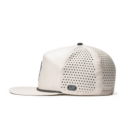 Side view of the Drifter Splash Ivory Mummy hat featuring a flat bill, ivory perforated panels, and Alter Ego reflective side logo.