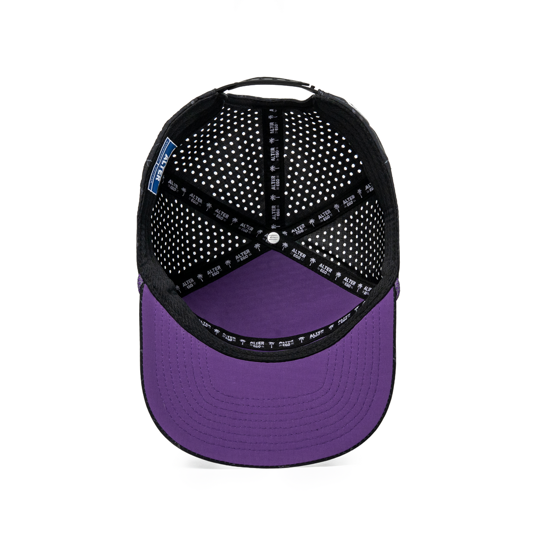 Inside view of the Drifter Splash Toxic Storm performance hat showing the black branded interior lining and purple underside of the flat bill.