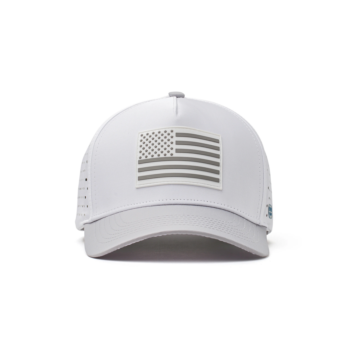 Front view of the Glacier White Coaster Splash hat featuring a raised silver American flag patch and clean structured front panel.