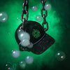Alter Ego Coaster Splash Toxic Storm running hat with a black storm pattern, neon green skull graphic, and purple accent trim displayed in a Halloween-inspired scene with hanging chains, green fog, and floating bubbles.