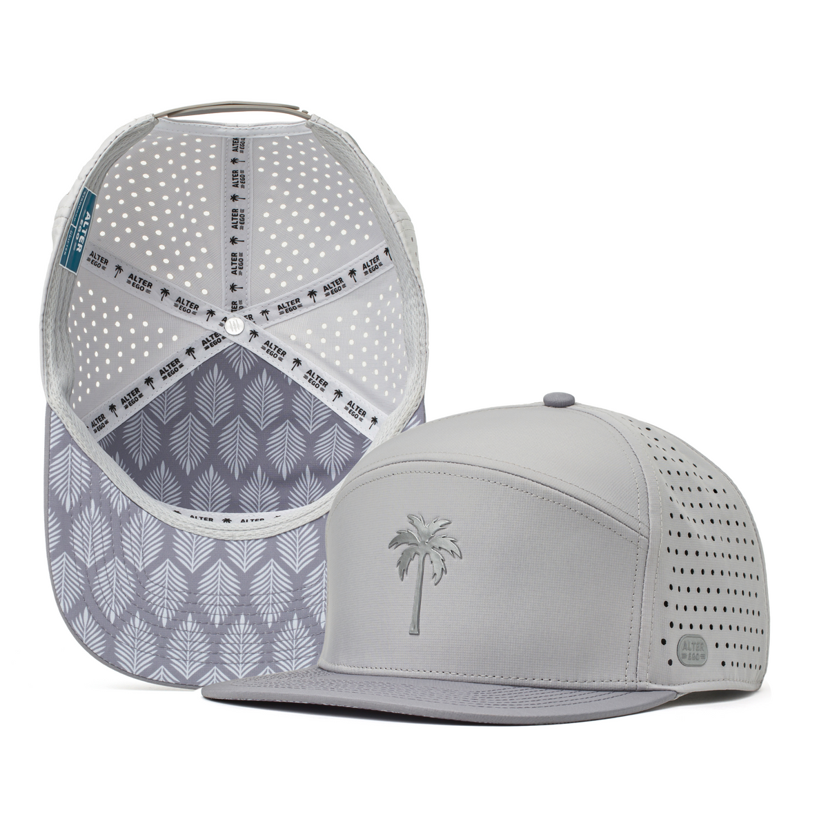 Alter Ego Drifter Splash Royal Chrome hat in a light chrome gray, shown with a flat bill, reflective palm tree logo, laser-cut back panels, a reflective Alter Ego side badge, and a gray palm leaf pattern on the underbill and interior.
